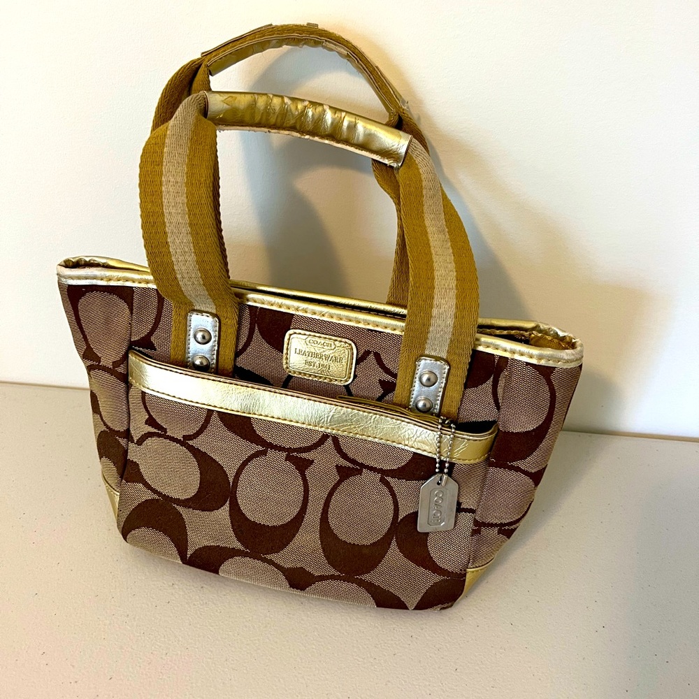 Gold coach purse